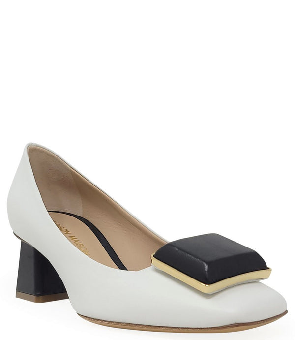 Elegant mid-heel pump handcrafted in Italy from 100% genuine leather, featuring a sculptural square embellishment on the toe and a block heel for all-day stability and style.