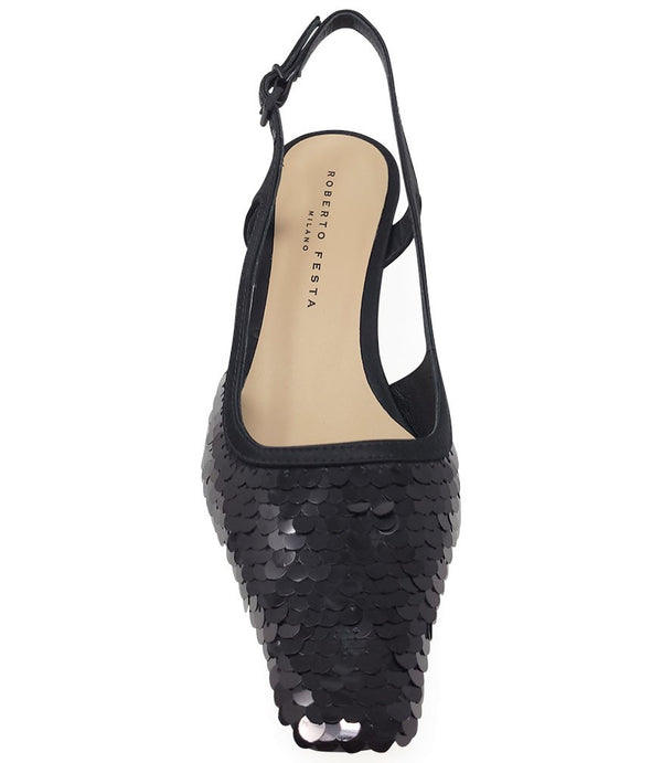 Handcrafted slingback shoe with sequin embellishments, low heel, and pointed toe design. Features an adjustable ankle strap and a textured surface for added visual interest
