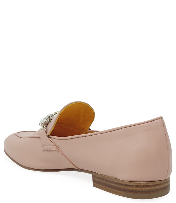 A leather loafer with a low stacked heel and rounded toe, featuring a decorative band adorned with faceted gemstone-style embellishments across the upper. Designed by Madison in Beverly Hills and handcrafted in Italy