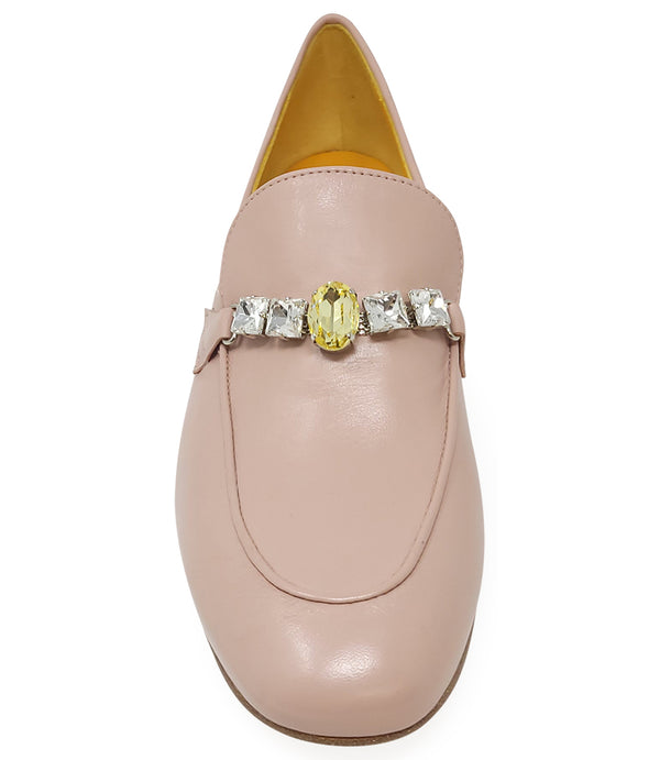 A leather loafer with a low stacked heel and rounded toe, featuring a decorative band adorned with faceted gemstone-style embellishments across the upper. Designed by Madison in Beverly Hills and handcrafted in Italy
