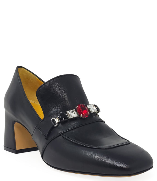 A leather heeled loafer with a block heel and square toe, featuring a decorative band with faceted gemstone-style embellishments across the upper. Designed by Madison in Beverly Hills and handcrafted in Italy.