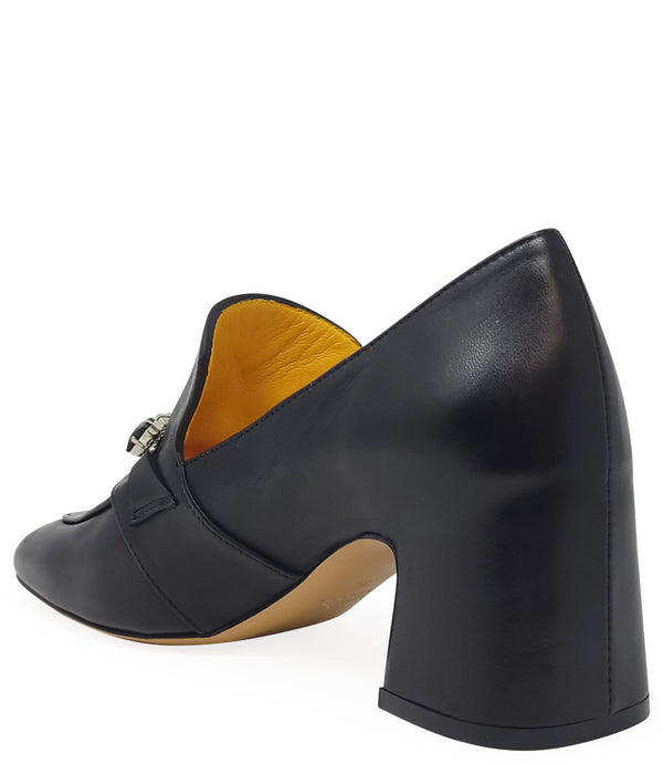 A leather heeled loafer with a block heel and square toe, featuring a decorative band with faceted gemstone-style embellishments across the upper. Designed by Madison in Beverly Hills and handcrafted in Italy.