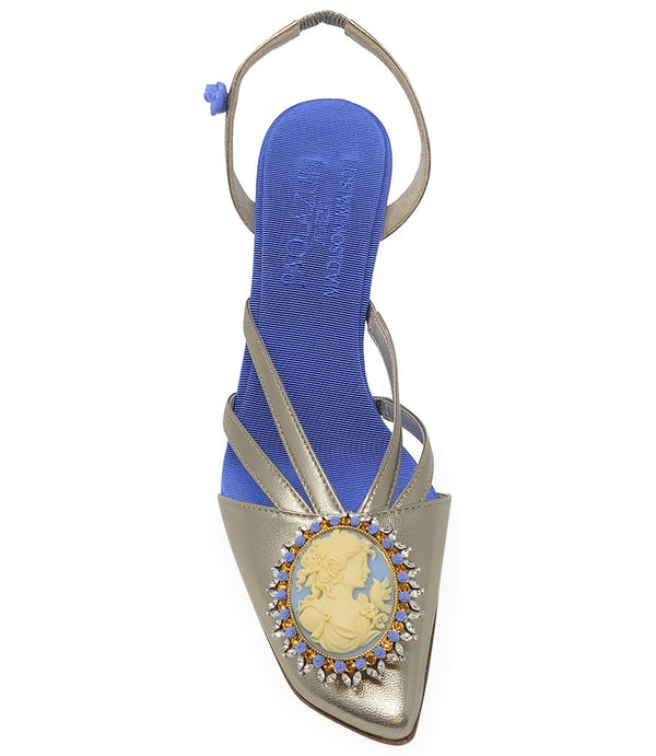 Handcrafted high-heel slingback sandal made in Italy, featuring a strappy upper, sculpted cameo embellishment with crystal detailing on the toe, and a smooth stiletto heel. Padded insole with contrast texture, shown from multiple angles against a clean ba
