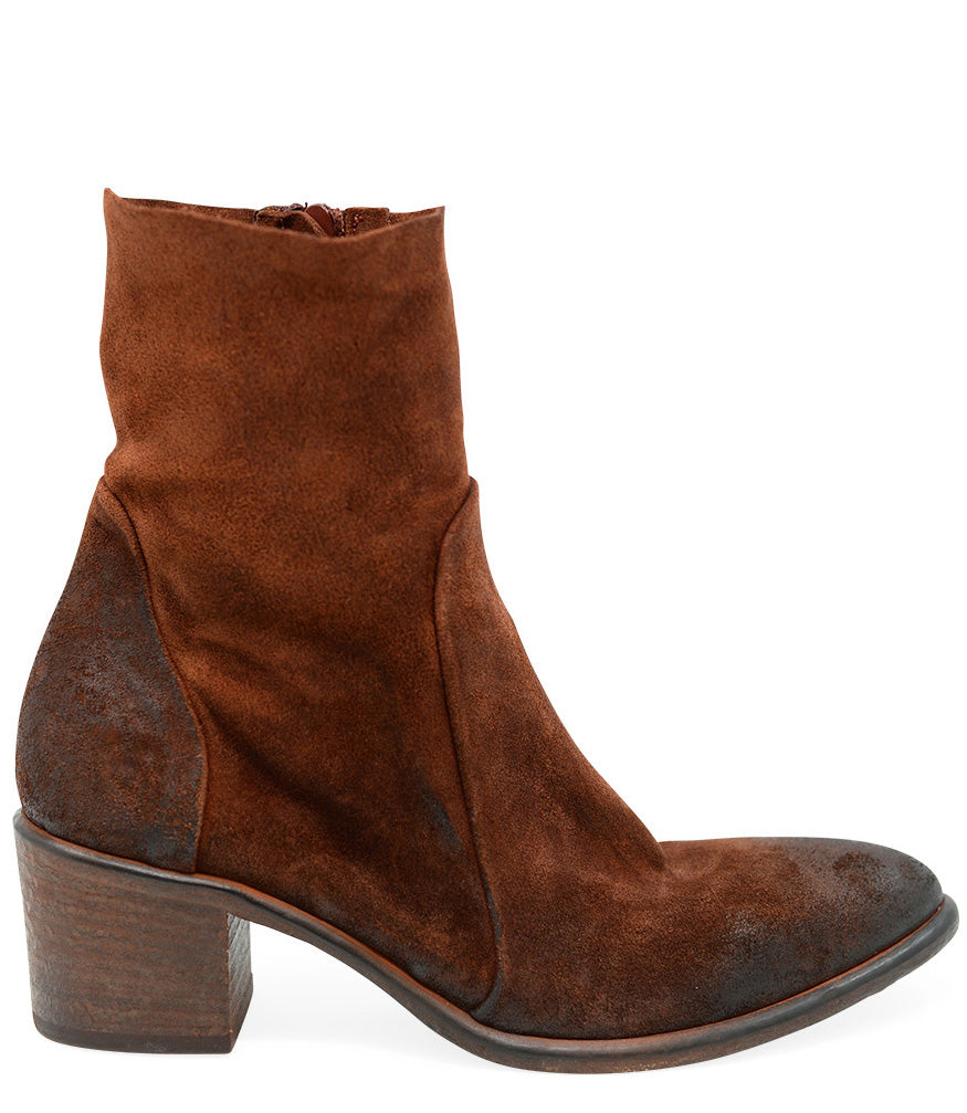 Ankle-height leather boot with a soft sheen finish, block heel, and side zipper closure. Designed with a rounded toe and minimal seam detailing.