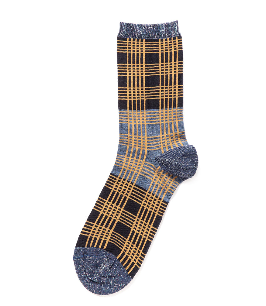 A mid-calf knit sock featuring a mix of textured panels, ribbed leg section, and bold horizontal stripes around the arch and cuff.