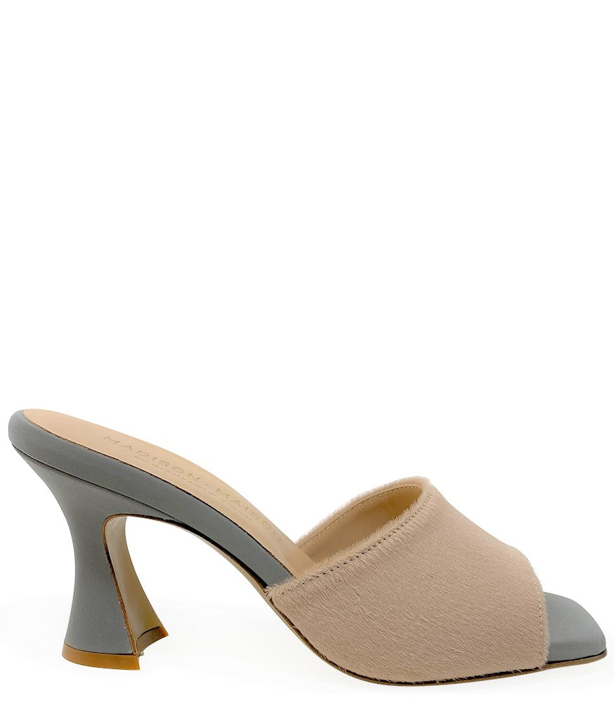 Handcrafted Italian mule with an open toe, flared heel, and a two-tone design. Features a wide vamp strap and cushioned insole for added comfort. Shown from multiple angles against a clean background