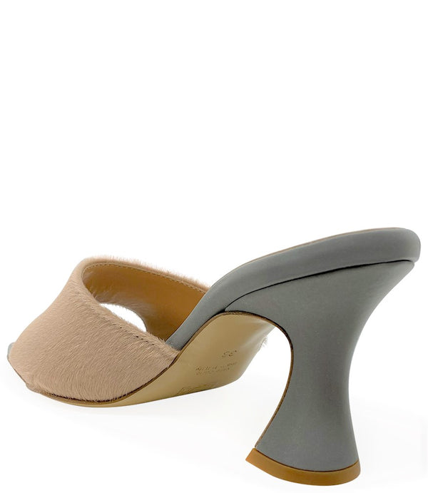 Handcrafted Italian mule with an open toe, flared heel, and a two-tone design. Features a wide vamp strap and cushioned insole for added comfort. Shown from multiple angles against a clean background