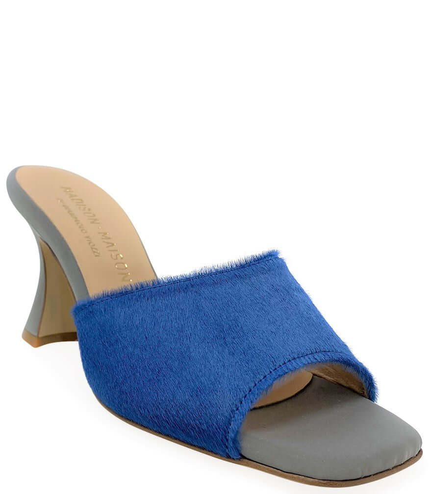 Denim blue calf hair heel mule with open toe and chunky gray heel