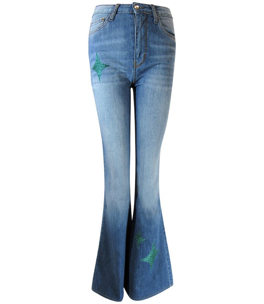 Flared-leg pants made in Italy with a mid-rise fit, featuring front and back pockets and star-shaped accents on the hip, lower leg, and back pocket. Displayed from multiple angles against a clean background