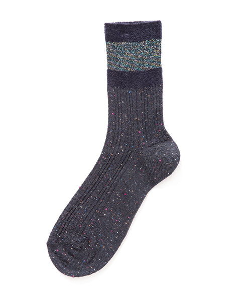 A mid-calf knit sock featuring a mix of textured panels, ribbed leg section, and bold horizontal stripes around the arch and cuff.