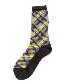 A mid-calf knit sock featuring a mix of textured panels, ribbed leg section, and bold horizontal stripes around the arch and cuff.