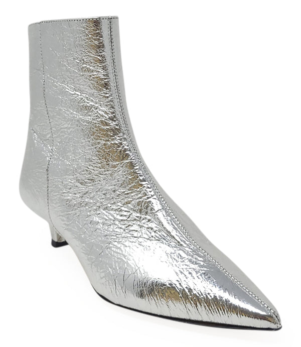 Pointed-toe ankle boot crafted from crinkled metallic leather, featuring a sleek side profile and a low kitten heel. Designed with a side zip closure for easy wear, a leather-lined interior for comfort, and a durable leather outsole. Contemporary and stre