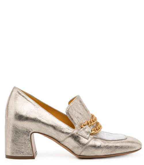 A leather heeled loafer with a block heel and rounded toe, featuring layered chain accents across the upper and a contrasting panel on the vamp. Designed by Madison in Beverly Hills and handcrafted in Italy.