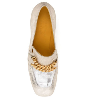 A leather heeled loafer with a block heel and rounded toe, featuring layered chain accents across the upper and a contrasting panel on the vamp. Designed by Madison in Beverly Hills and handcrafted in Italy.
