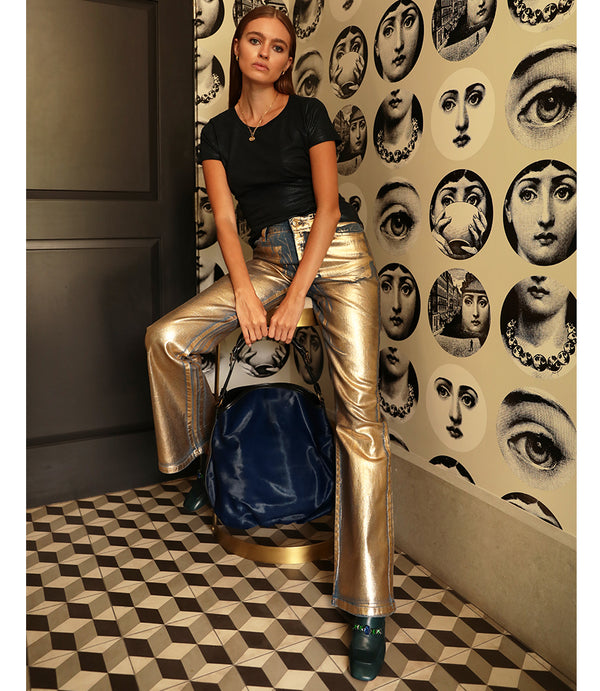 A leather heeled loafer with a block heel and square toe, featuring a decorative band with faceted gemstone-style embellishments across the upper. Designed by Madison in Beverly Hills and handcrafted in Italy.