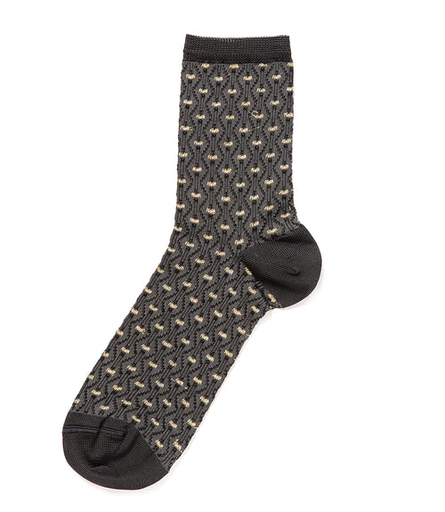 A mid-calf knit sock featuring a mix of textured panels, ribbed leg section, and bold horizontal stripes around the arch and cuff.