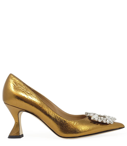 Pointed-toe pump crafted from premium leather with a softly crinkled finish, featuring an embellished jeweled buckle at the toe and a sculpted flared kitten heel. Designed with a leather-lined interior and a leather outsole for comfort and durability. Ele
