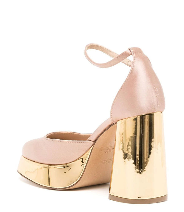 Women's Italian-made closed-toe platform heel featuring a bold metallic block heel, cushioned leather insole, and ankle strap closure for secure and stylish support. Expertly crafted for elevated comfort and striking presence.