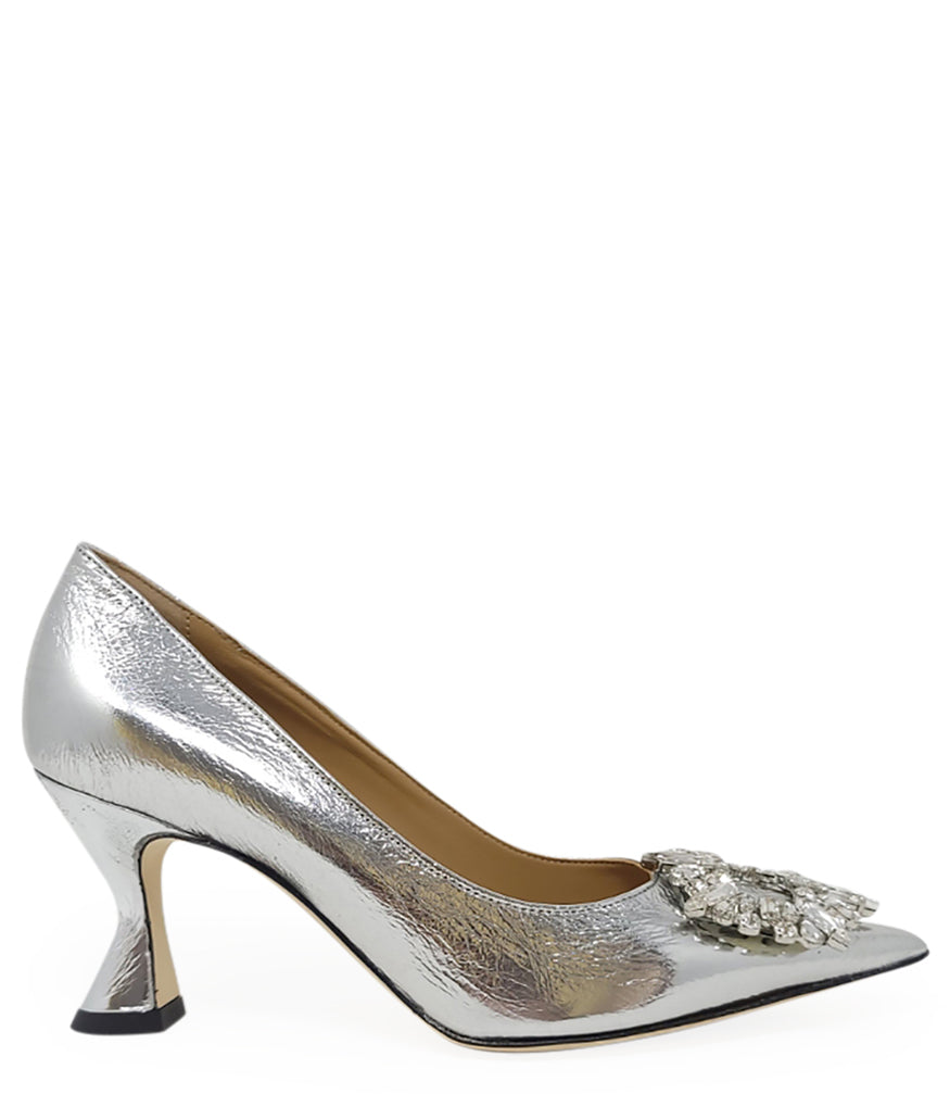 Pointed-toe pump crafted from premium leather with a softly crinkled finish, featuring an embellished jeweled buckle at the toe and a sculpted flared kitten heel. Designed with a leather-lined interior and a leather outsole for comfort and durability. Ele
