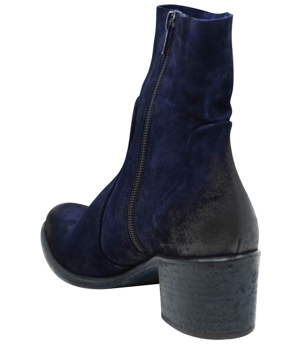 Ankle-height leather boot with a soft sheen finish, block heel, and side zipper closure. Designed with a rounded toe and minimal seam detailing.
